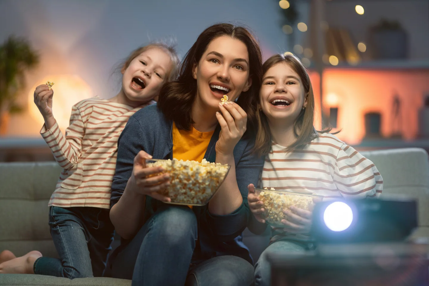 A household relaxing together in front of the TV